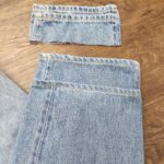 ブリーチ加工されたジーンズ　淡色（たんしょく）デニム　裾上げアタリ出し加工